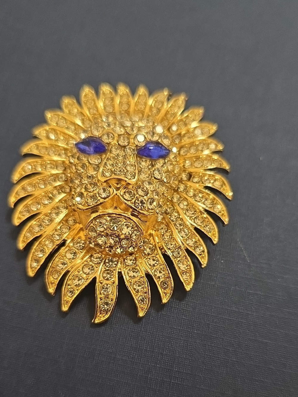 Stunning Gold Lion Head Brooch with Blue Eyes